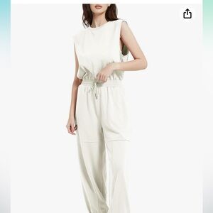 New With Tags. Flygo jumpsuit, cap sleeves,wide leg, drawstring romper!